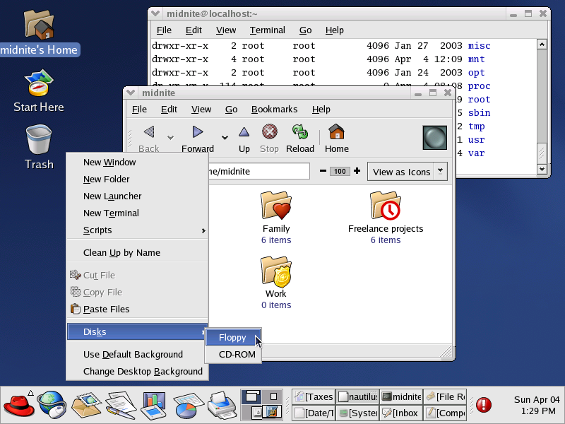 Desktop with applications in GNOME 2.2.0 in RedHat 9. Desktop with applications in GNOME 2.2.0 in RedHat 9.